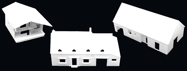 Trois maquette de maison blanche sur fond noir